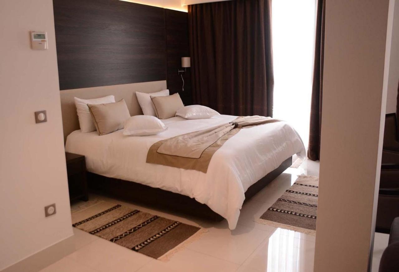 Radisson Hotel Сфакс Екстер'єр фото A bedroom