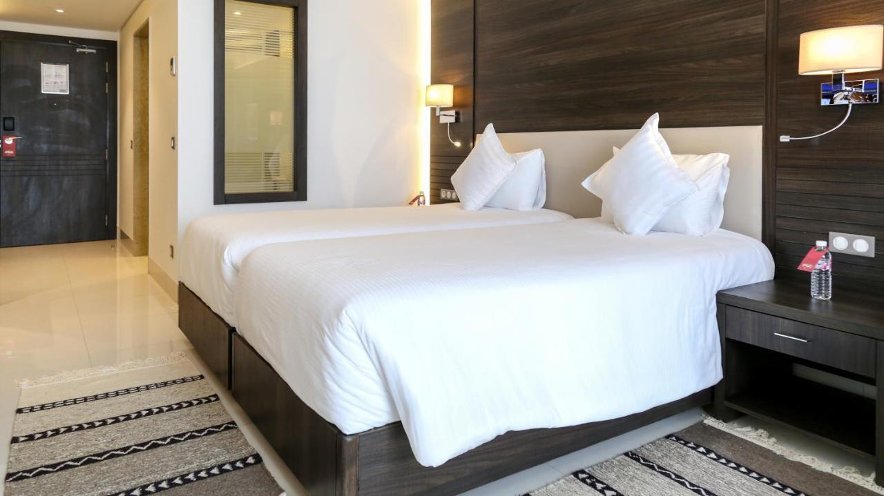 Radisson Hotel Сфакс Екстер'єр фото A bedroom at the hotel